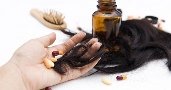 Какие витамины принимать при выпадении волос?