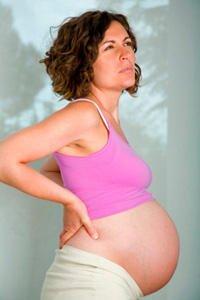 Стреляющая боль в пояснице при беременности 