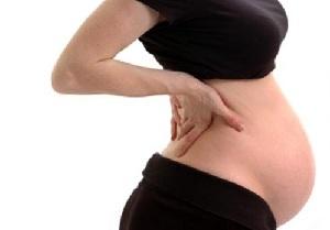 При беременности вполне естественно появление боли в спине